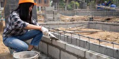 Can I build a retaining wall on a concrete slab