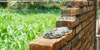 How deep should retaining wall posts be