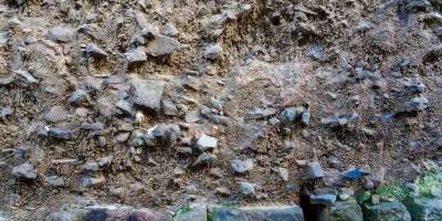 How to build a boulder retaining wall
